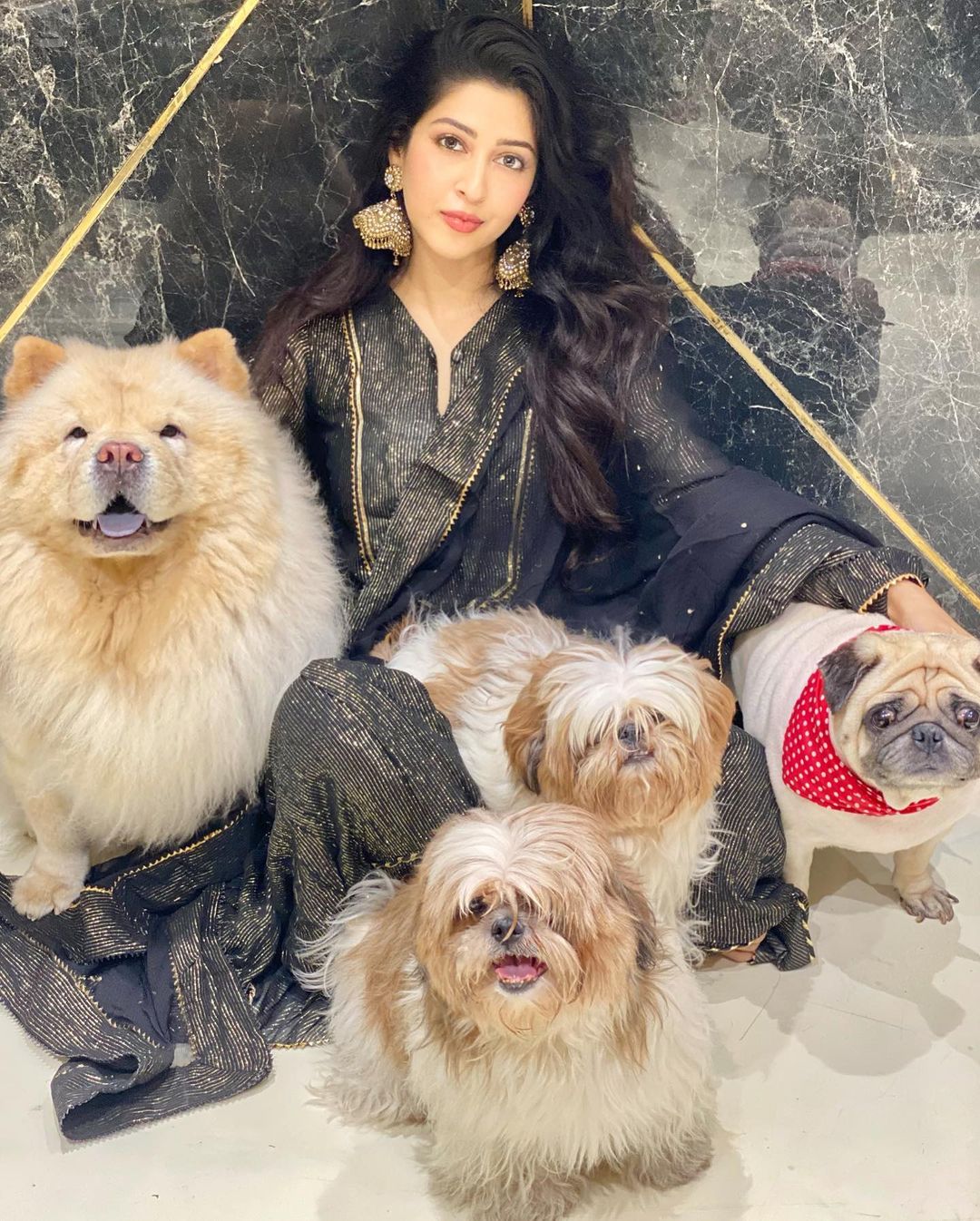 Sonarika with her pet dogs