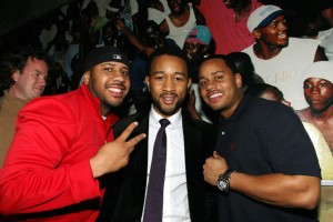 John Legend with his brother in red shirt