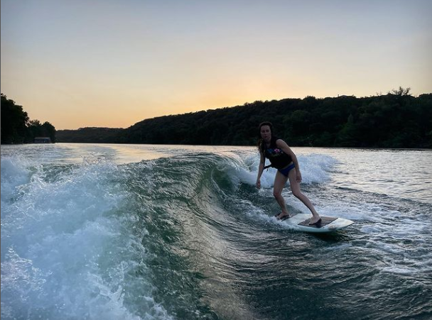 Liv while surfing