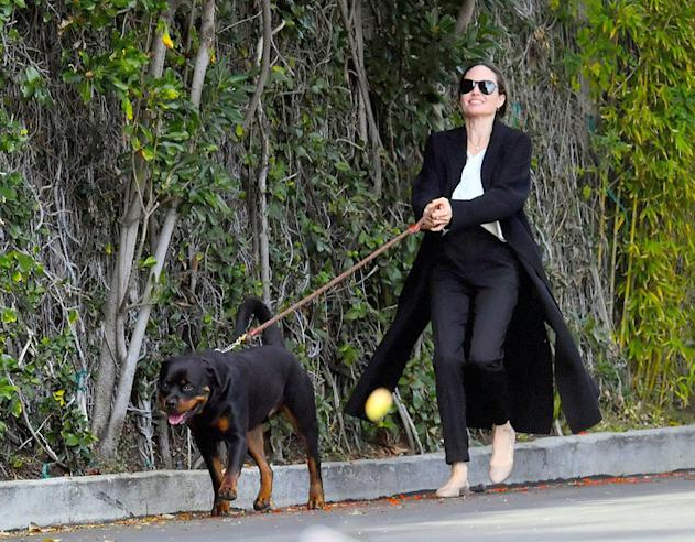 Angelina with her pet dog