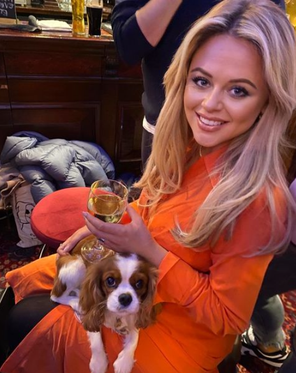 Emily atack with her pet dog