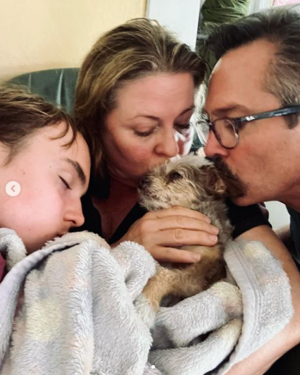 Thomas lennon with his pet dog and family